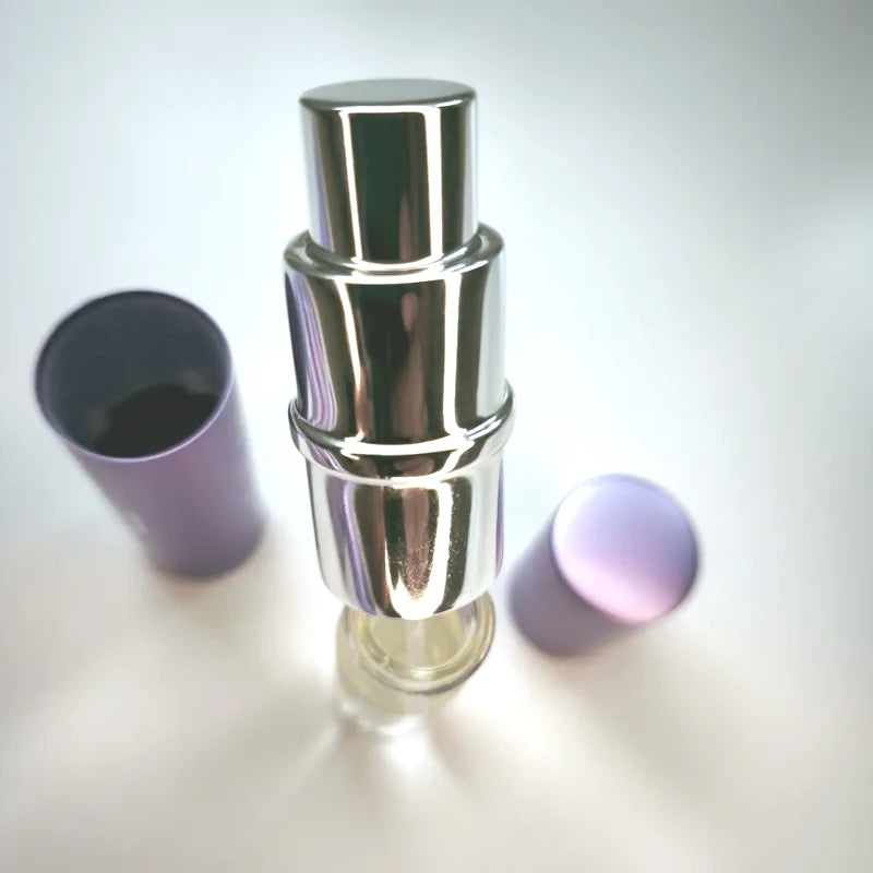 Lavande Précieuse refillable travel spray — inner glass vial, compact lavender metal casing. Purse-size fragrance. Made in France | LaPeNu